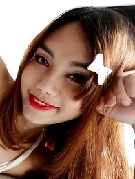 Lovely Thailand ladyboy takes white pipe up the ass