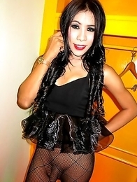 Minnie is dressed in ultra slutwear for a barebacking session! Her thick hard cock is packed in fishnet pantyhose