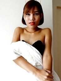 18 year old horny Thai shemale Natty striptease to black panties and hard cock
