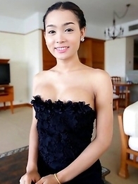 22 year old Thai shemale Samy teases tourist on camera in her black dress