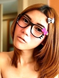 19 year old shy Thai ladyboy May gets naked and does a striptease