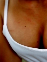 21yo busty Thai shemale Bam does a striptease for the camera