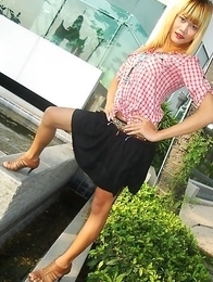 Adorable blonde Ladyboy Wa takes self shot pics