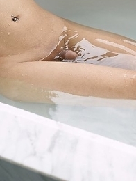 Allison is taking a shower in a very sensual way..