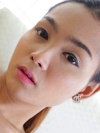Sexy Thai ladyboy Samy gets load shot all over her by white stud